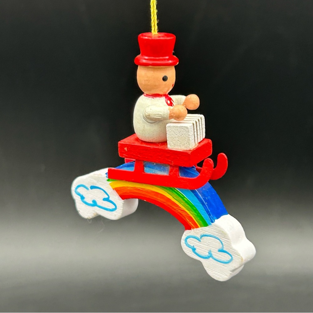 Vintage Ornament Man on Sled Over Rainbow Clouds Pride Hand Painted USA 2.5”